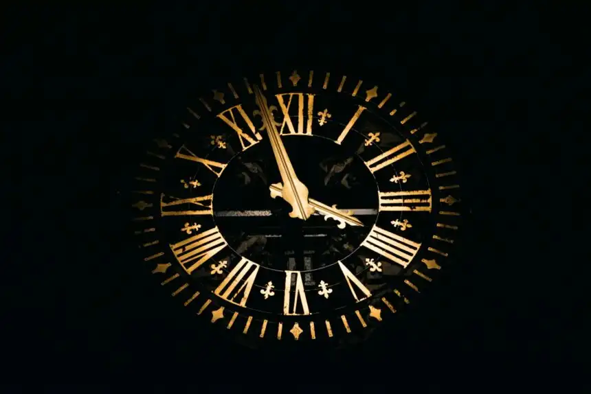 round black and brown analog clock