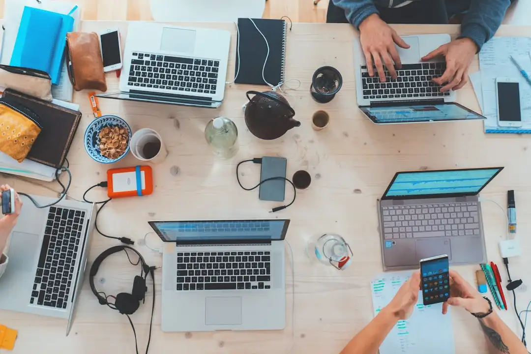 Professionals working collaboratively in modern office representing career skills for AI era